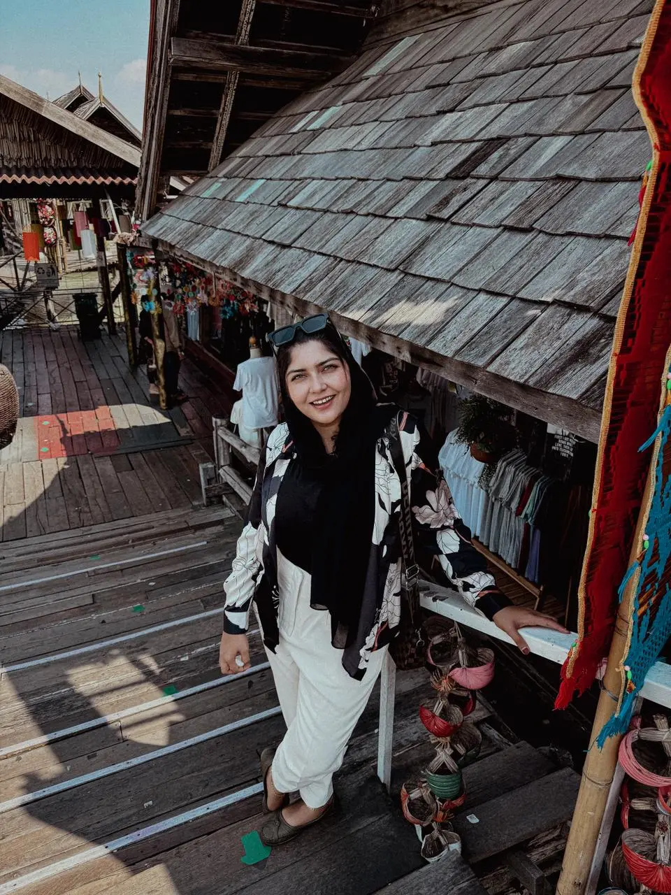 Digital marketing specialist at a traditional outdoor market.